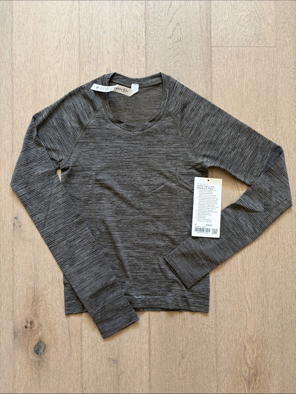 NWT swiftly tech long sleeve race length wee are from space army green lulu sz 4